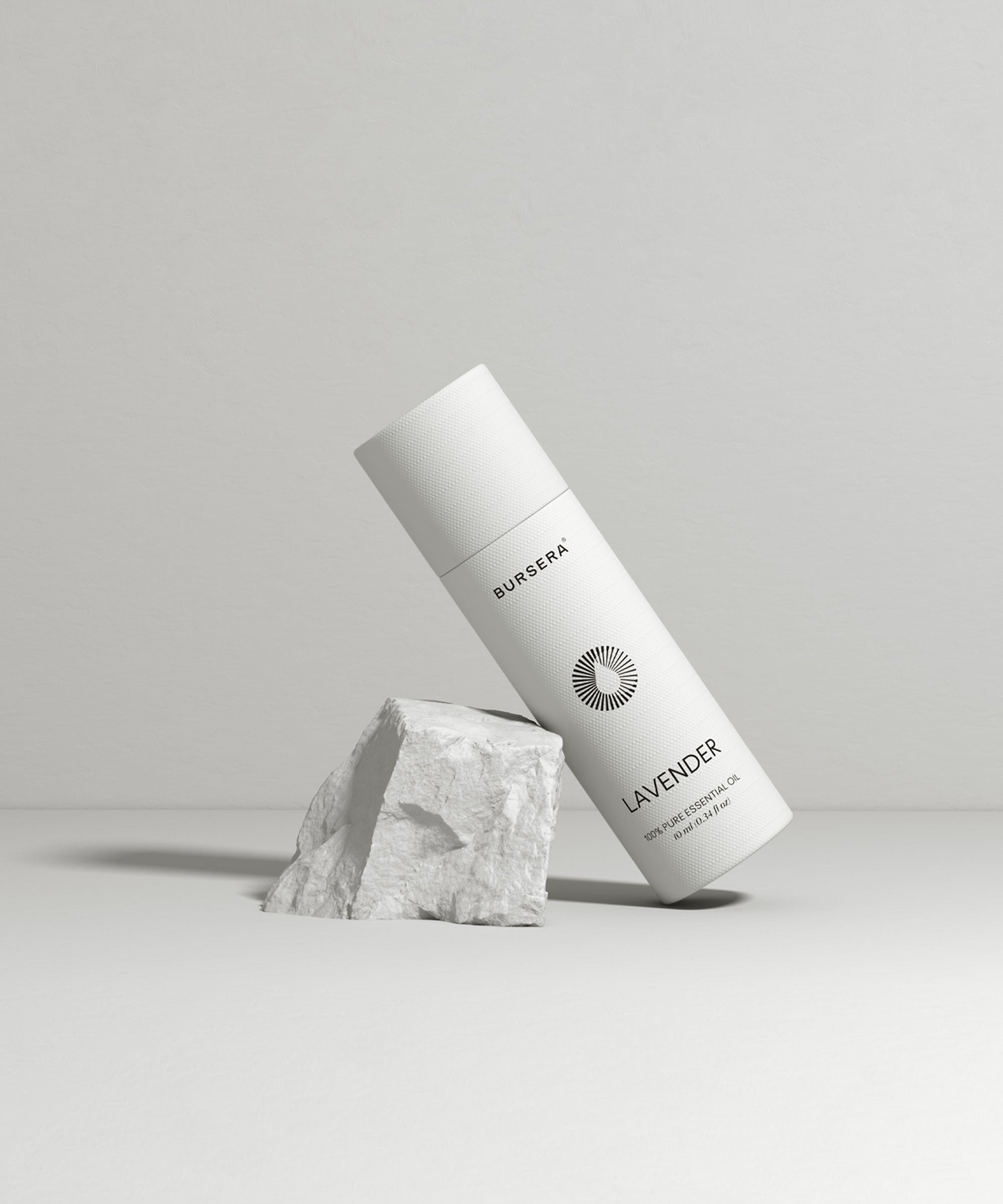 White skincare bottle labeled 'Lavender' on a gray background