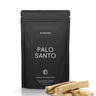 Black package of Bursera Palo Santo incense sticks on a white background