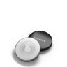 Round white compact with black lid featuring 'Bursera' branding on a white background