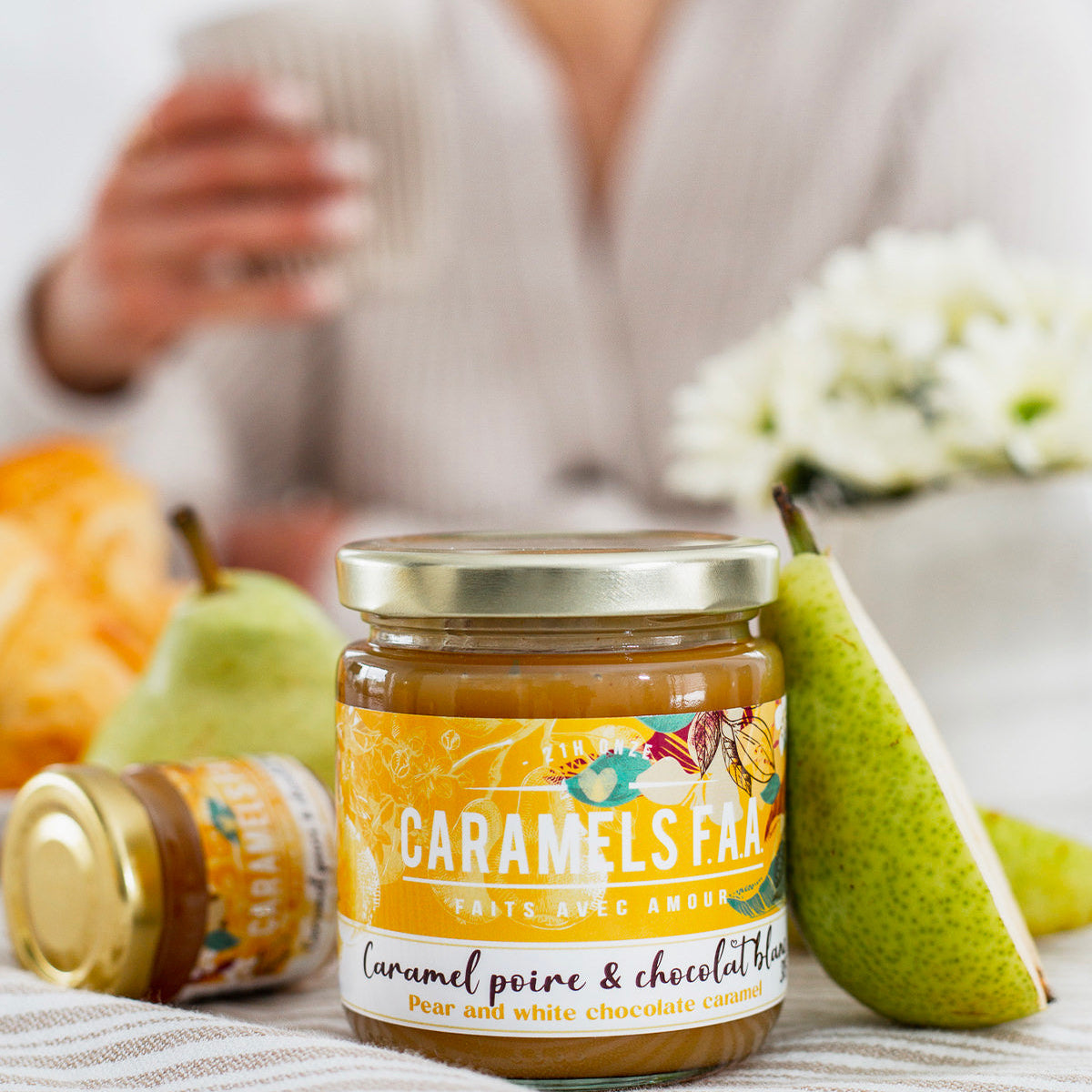 Jar of Caramels & Co caramel with pears on a table