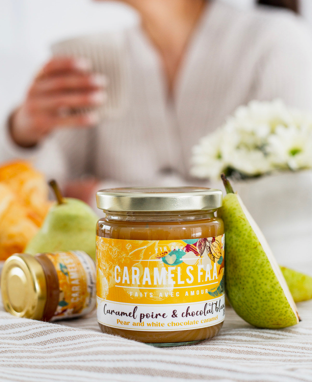 Jar of Caramels & Co caramel with pears on a table