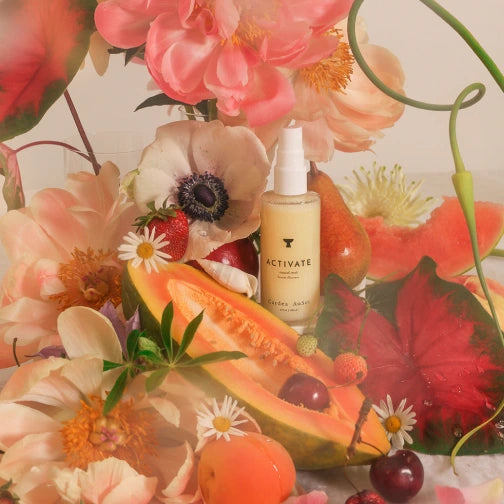 Cardea AuSet 'Activate' Mood Mist surrounded by fruits and flowers