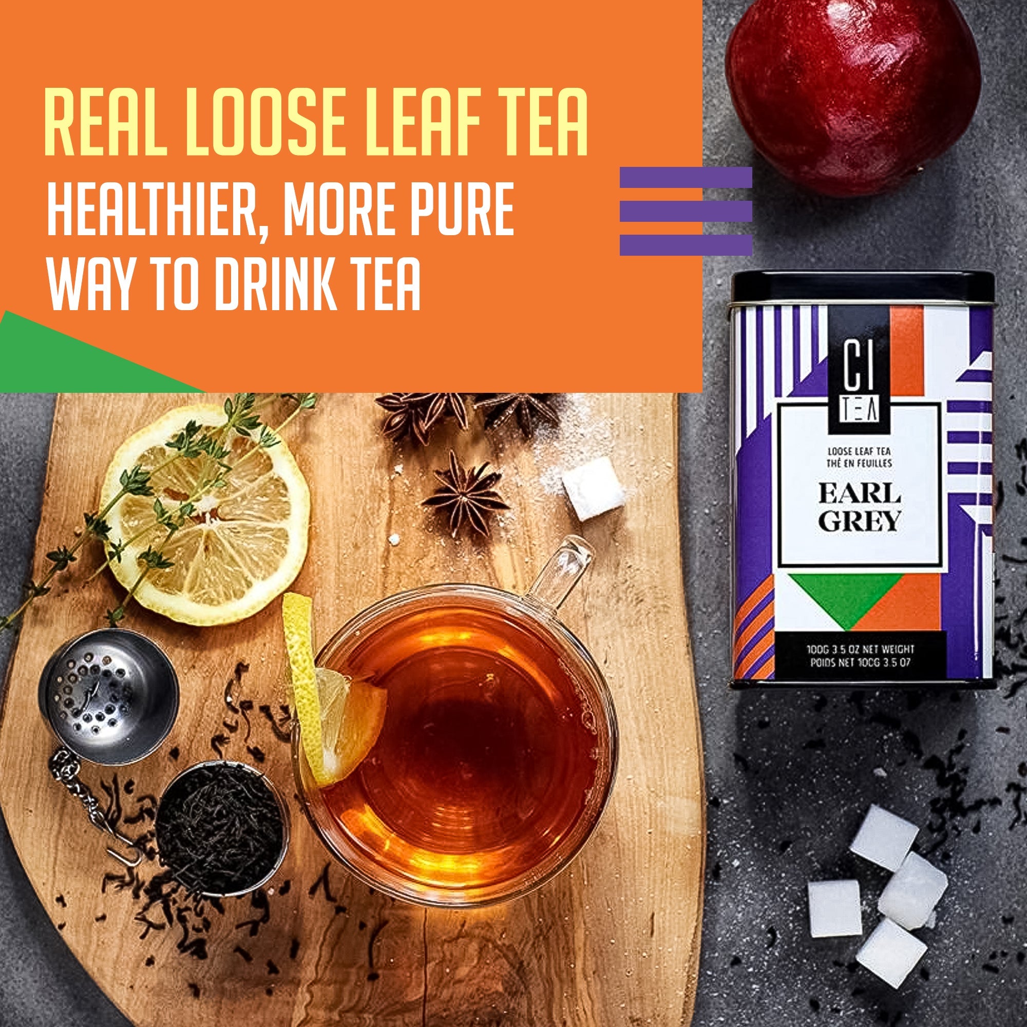 Tea packaging with a cup of tea, lemon slices, and spices on a wooden board.