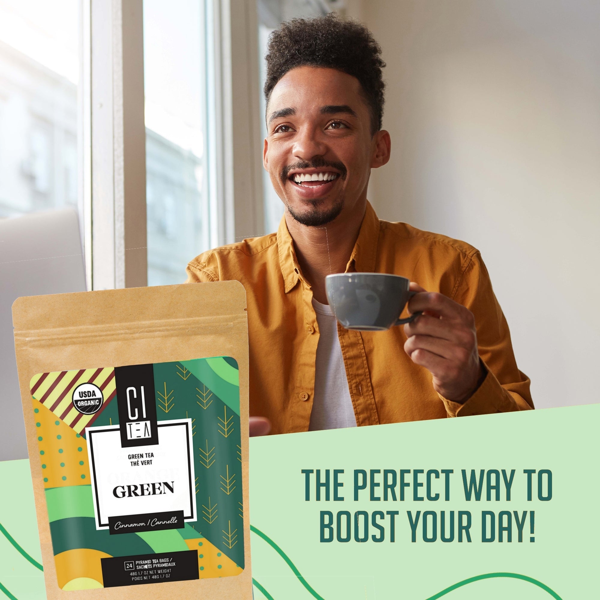 Man holding a cup with a green tea package and promotional text in the foreground