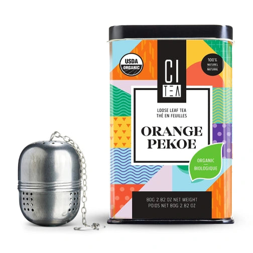 Colorful tea canister labeled 'Orange Pekoe' with a metal tea ball on a white background Citea Pure Organic Orange Pekoe loose leaf tea