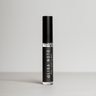 Black lip gloss bottle with 'LISA NOTO' branding on a gray background