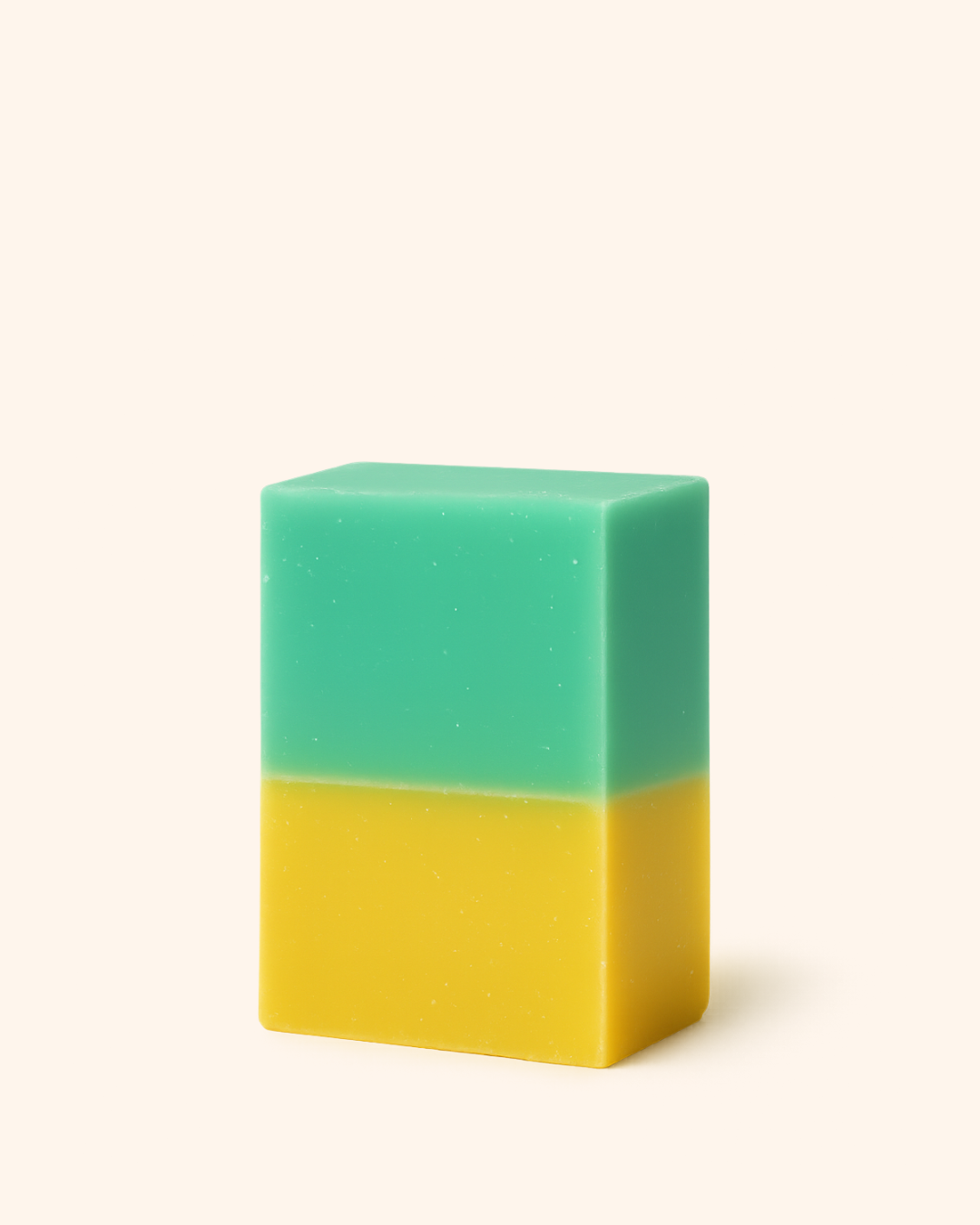 Two-toned green and yellow rectangular block on a white background