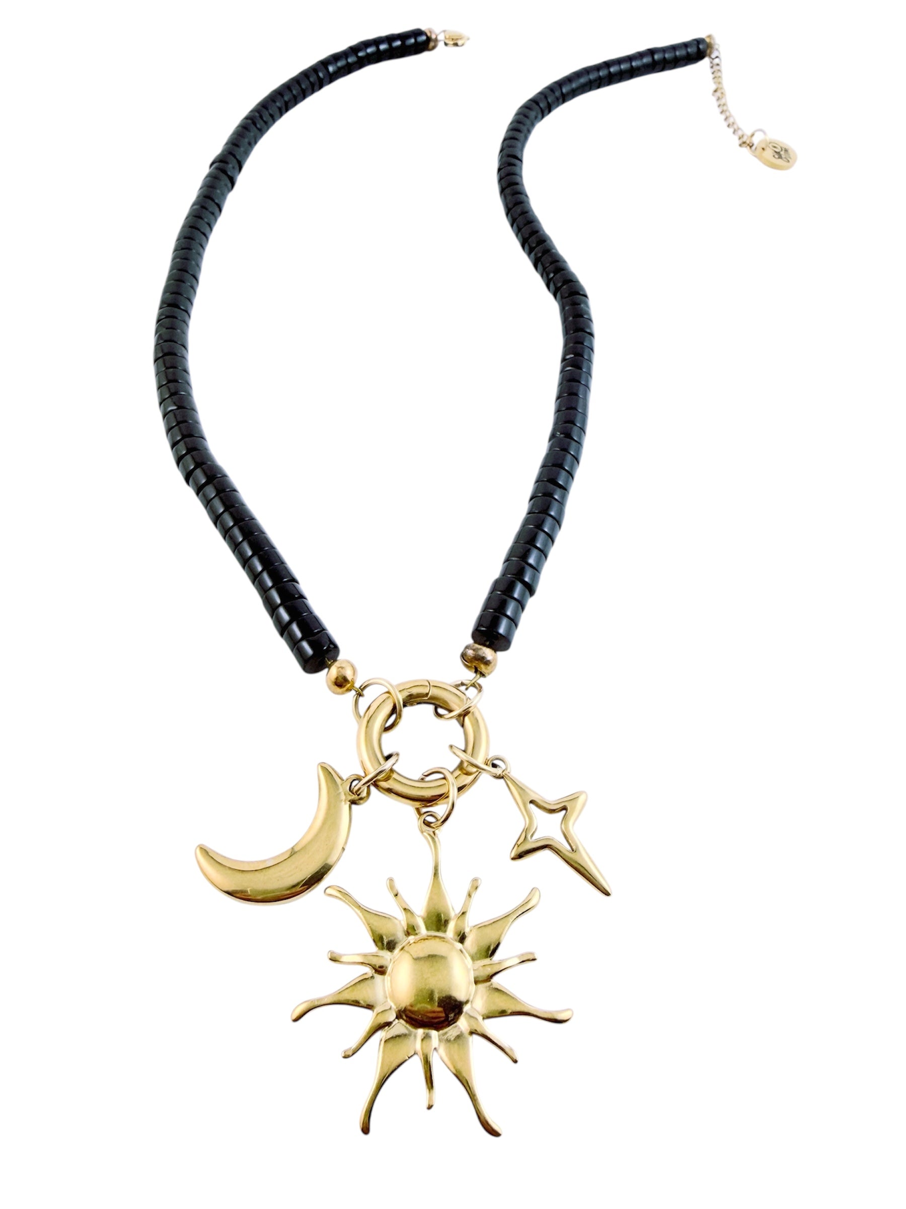 Moonrise Necklace - Onyx with gold sun, moon, and star charms on a black beaded chain against a white background