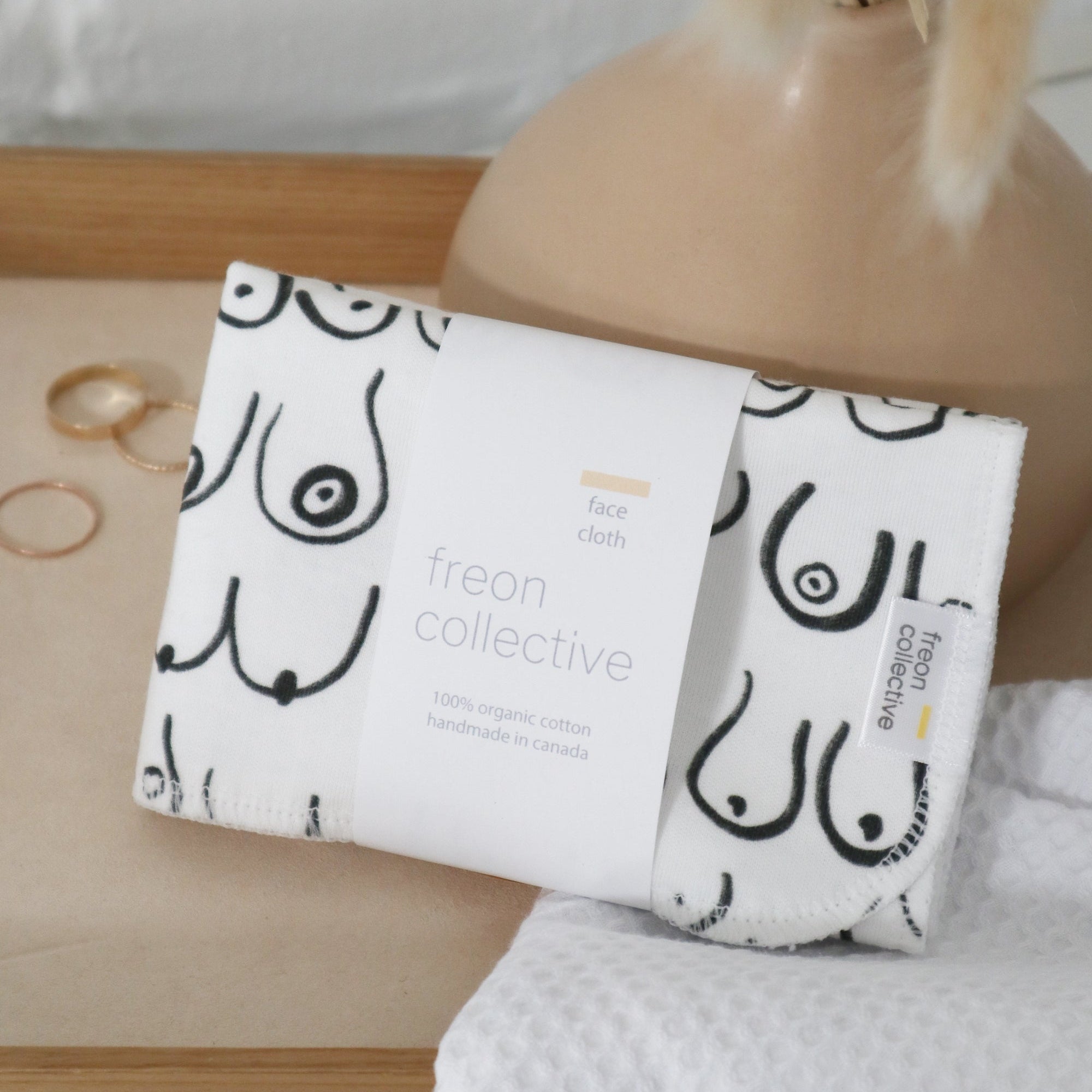 Black and white resuable cotton facecloths by Freon Collective