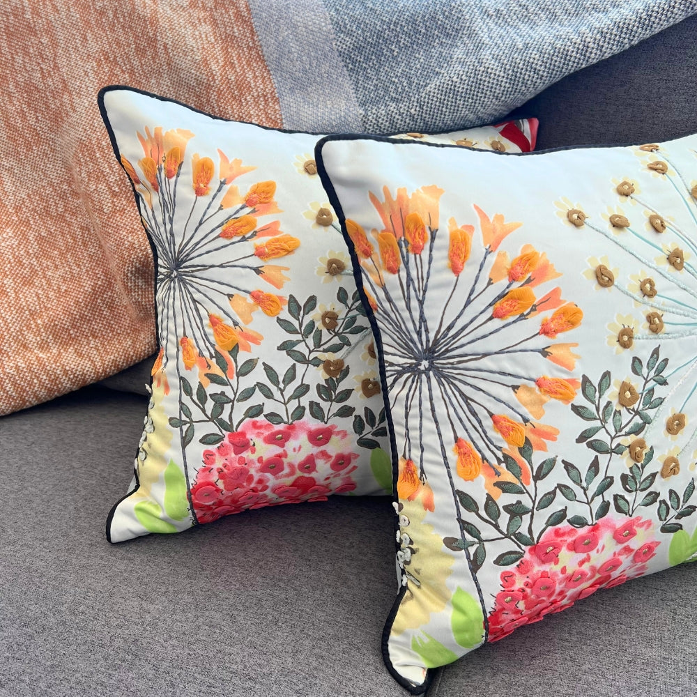 Floral patterned pillows on a textured surface