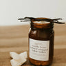 Vanilla bean infused whipped butter in an amber jar on a wooden surface