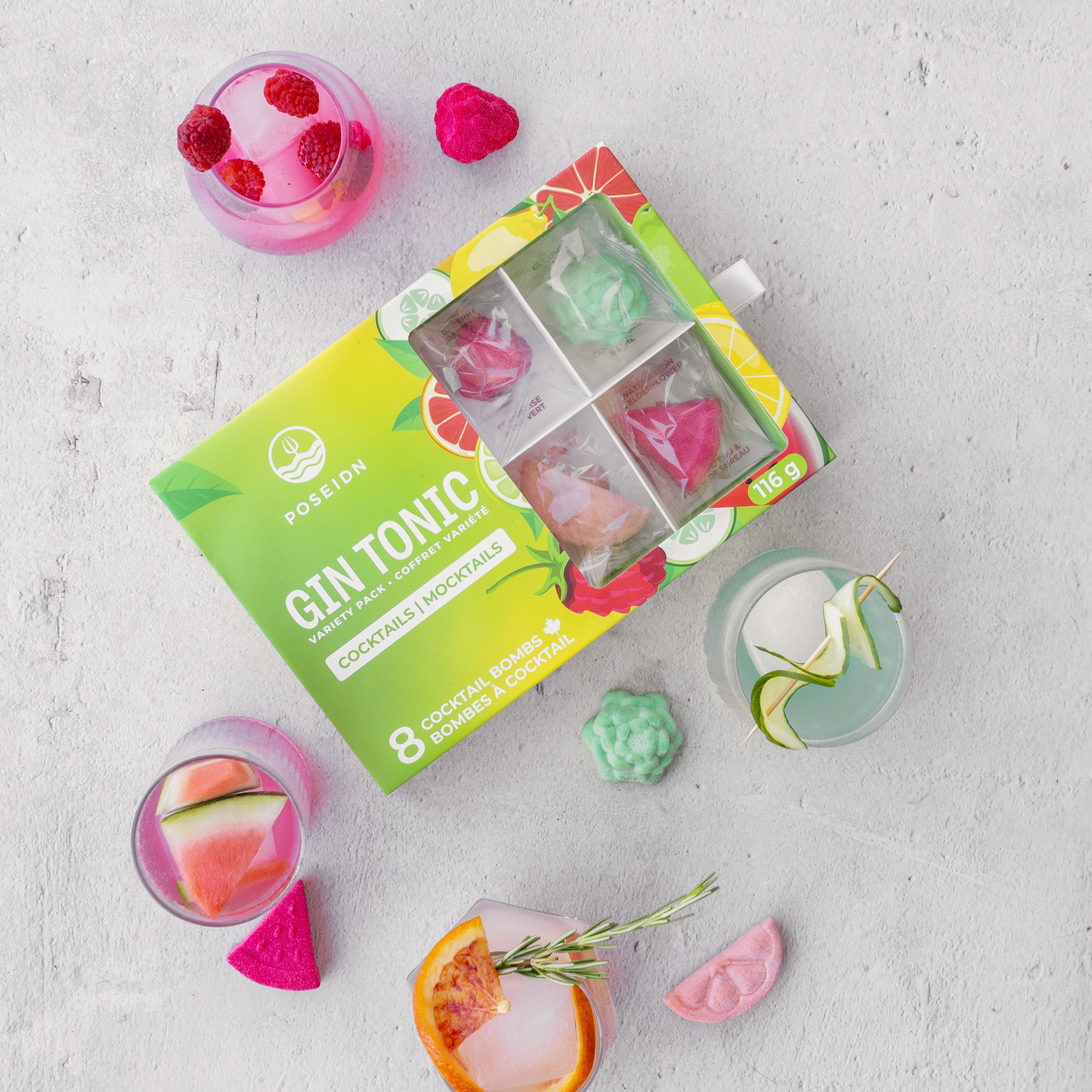 Gin tonic ice cube tray with colorful ice cubes on a light gray surface