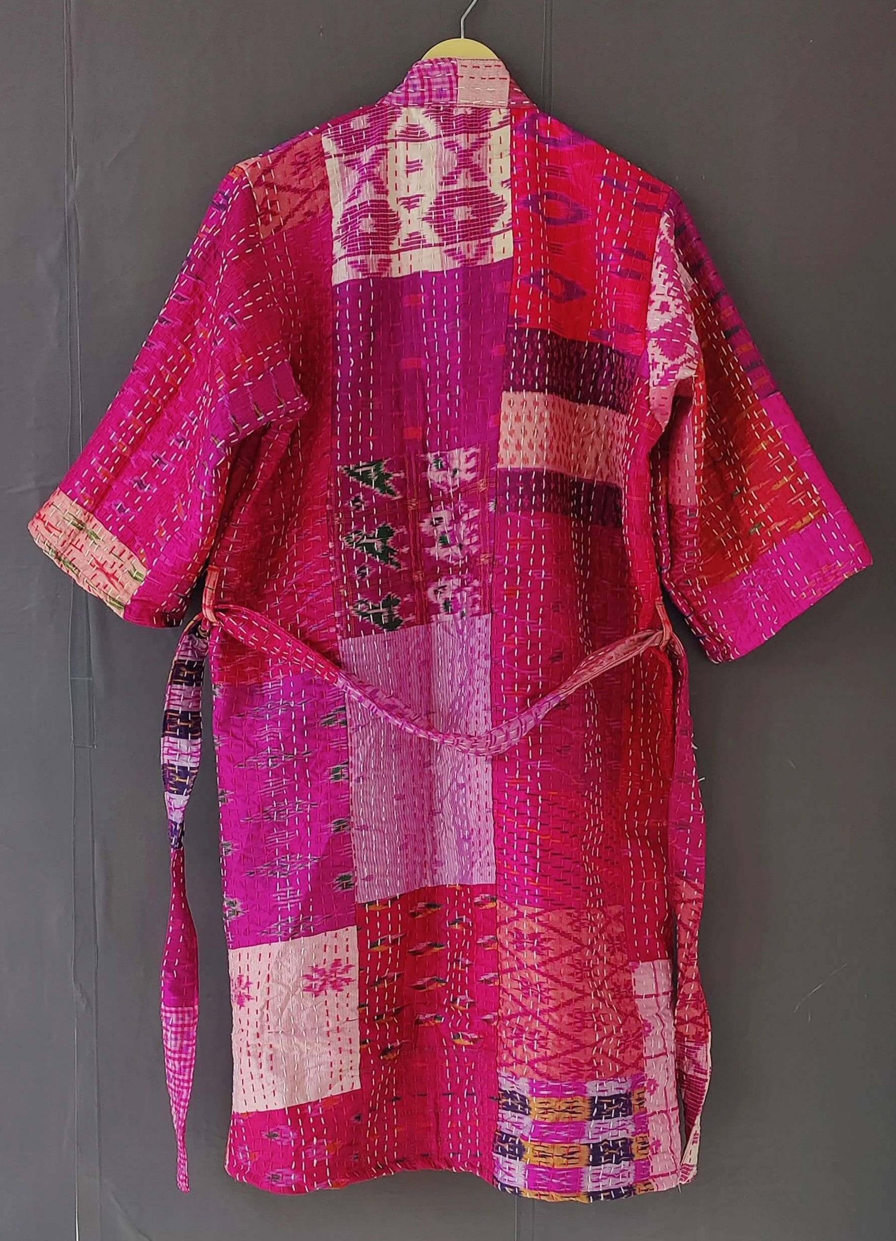 Handmade Kantha quilted kimono bathrobe in vibrant pink, crafted from organic cotton. Versatile and stylish layering piece.