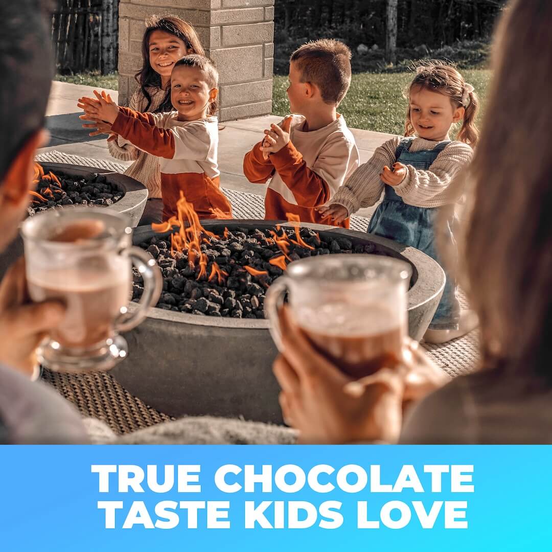 Four children gathered around an outdoor fire pit with flames, holding mugs of hot chocolate in a backyard setting. A bright blue banner at the bottom reads 'TRUE CHOCOLATE TASTE KIDS LOVE' in white text.