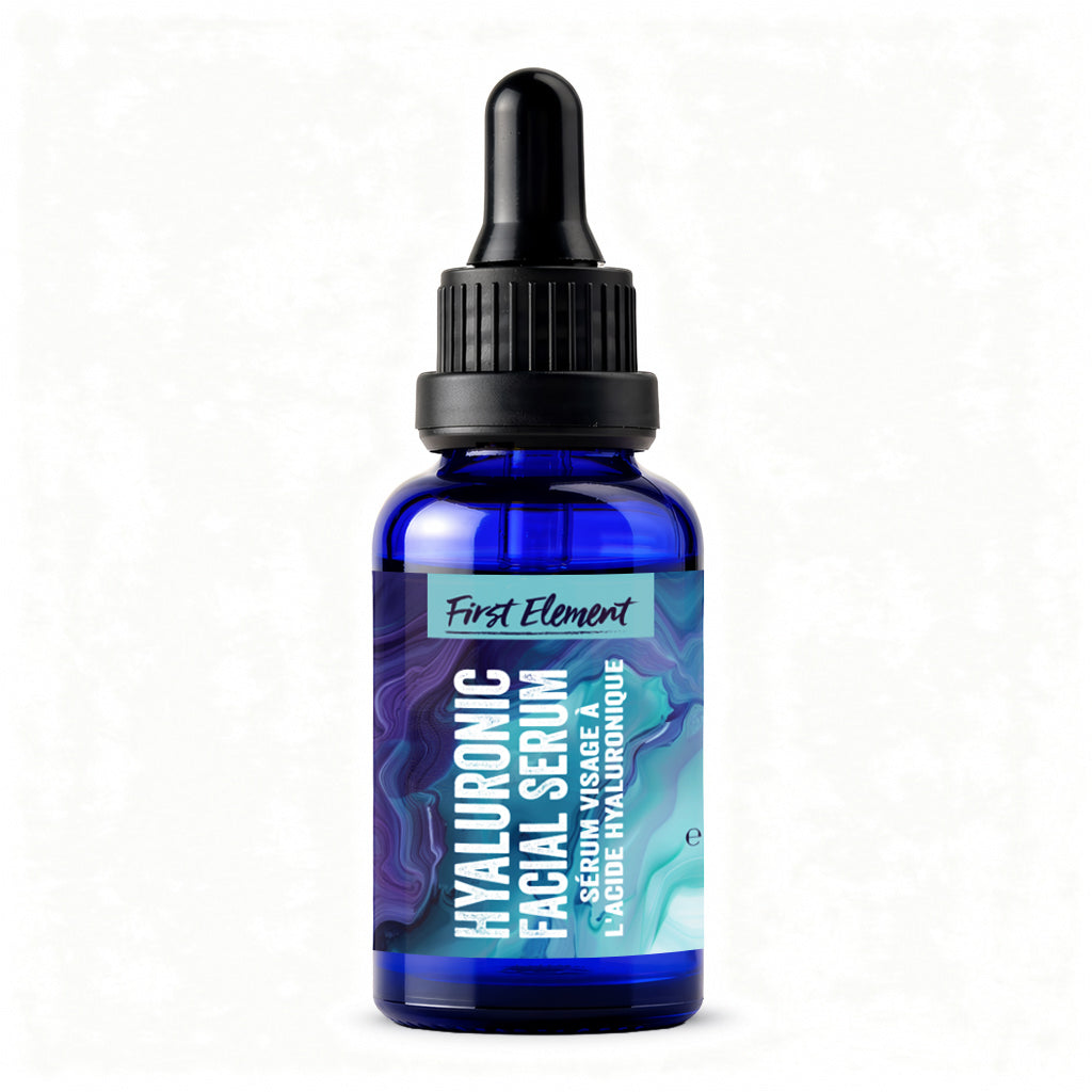 First Element | Premium Hydrating Hyaluronic Serum bottle with dropper on a white background