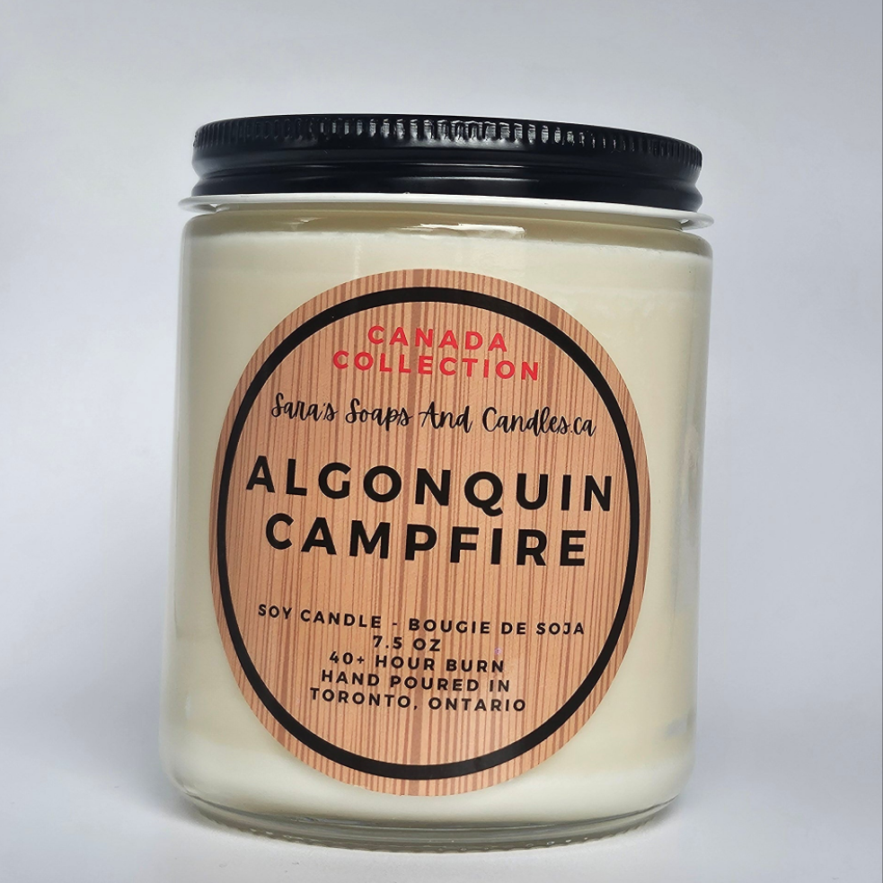 Candle jar labeled 'Algonquin Campfire' from Canada Collection on a white background