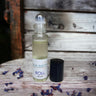 Roll-on bottle labeled 'one earth' with a wooden background