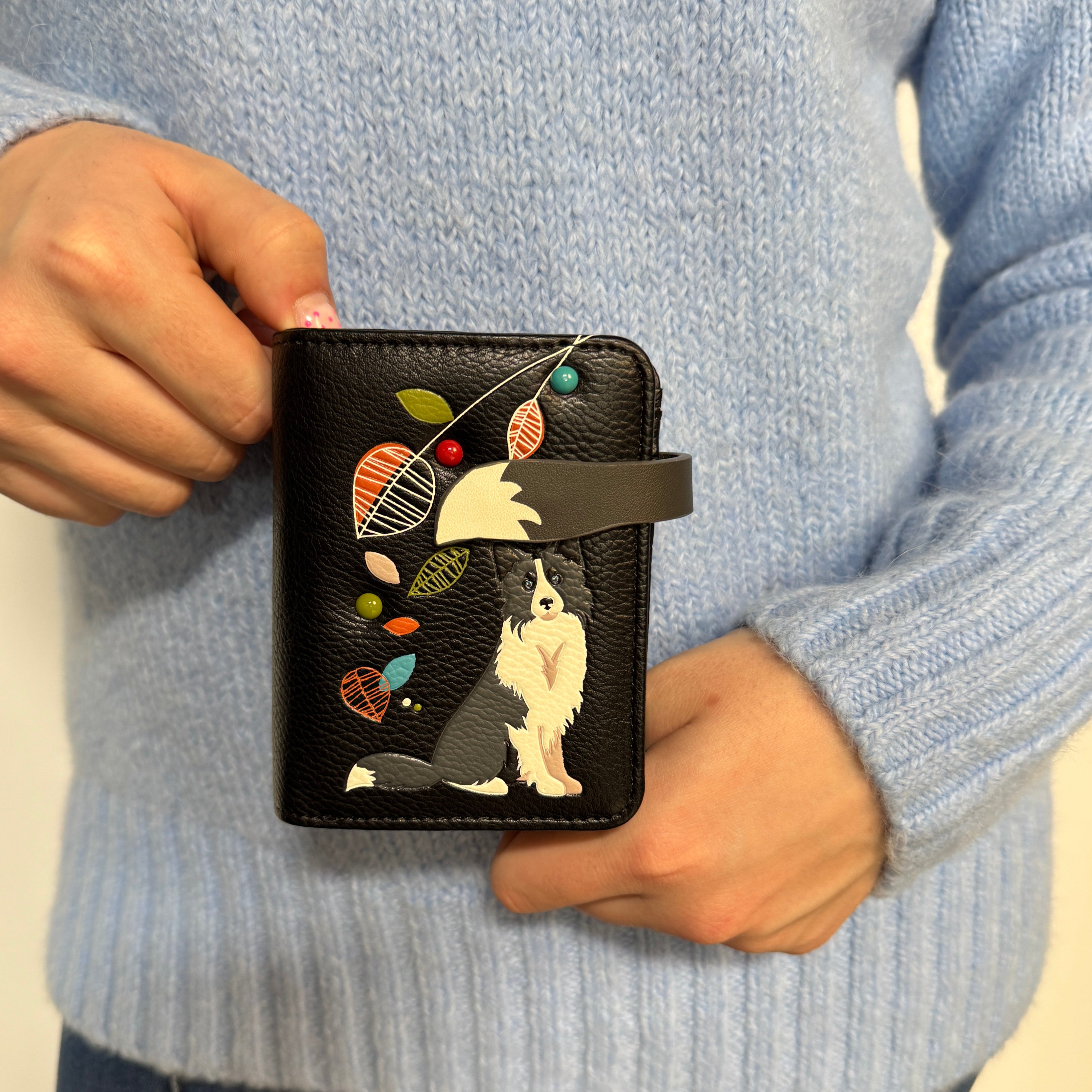 A Espe Vegan Corp wallet with dog motif