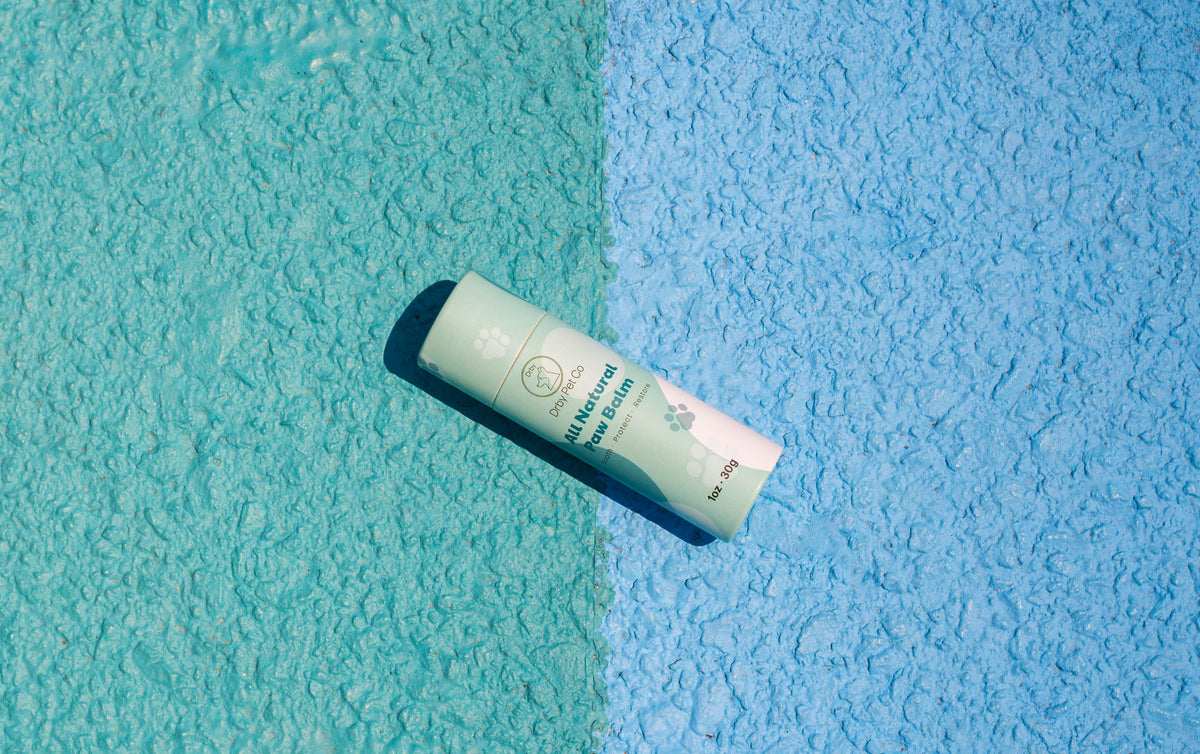 Drby Pet Co natural paw balm on blue