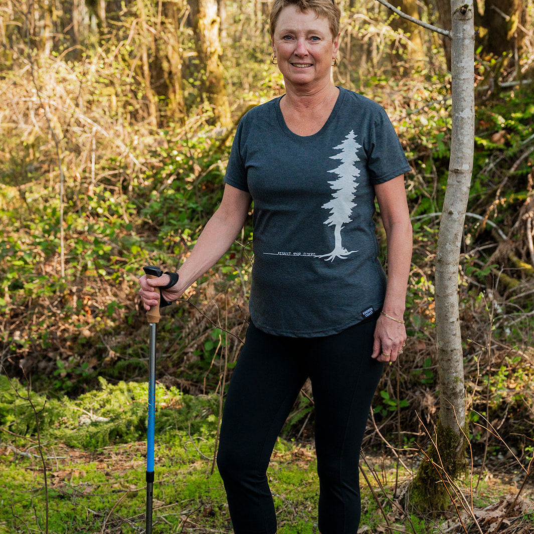 ELDERS - Women's Eco Tee blue Kindred Coast forest scene
