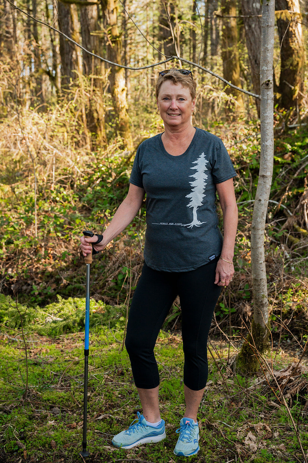 ELDERS - Women's Eco Tee blue Kindred Coast forest scene
