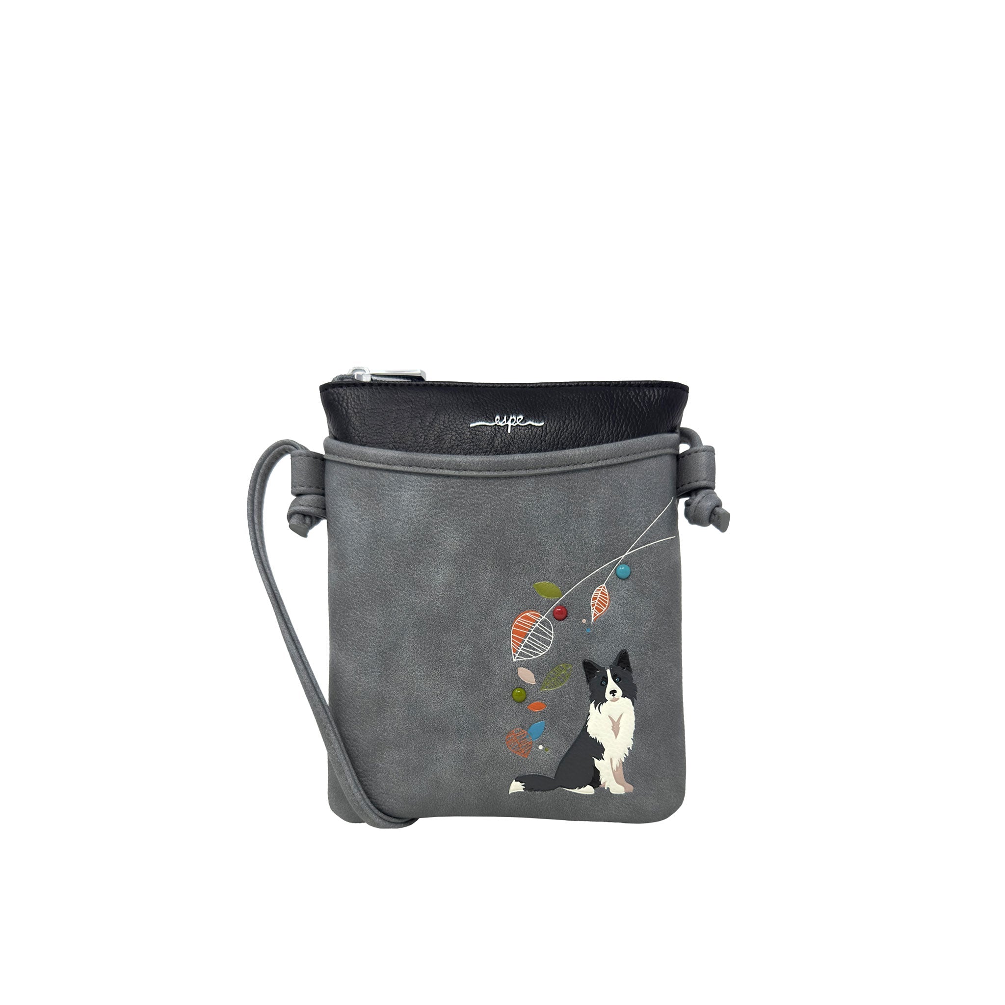 A gray faux-leather crossbody bag featuring a printed illustration of a black and white dog next to colorful balls of yarn. The bag has a black zippered top, a gray shoulder strap, and a silver zipper pull.