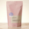 Handmade bath soak packaging with 'Midnight Paloma' branding on a beige background