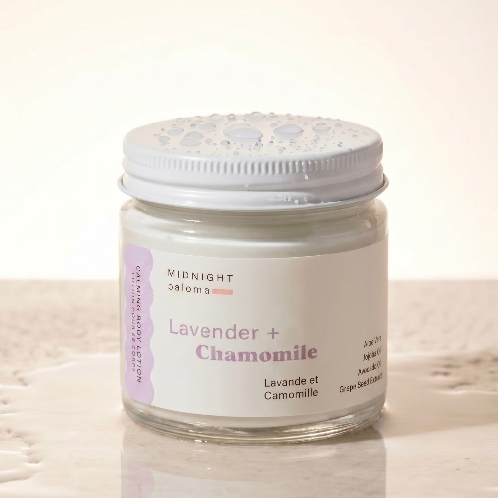 Jar of lavender and chamomile product on a light background