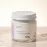 Jar of lavender and chamomile product on a light background