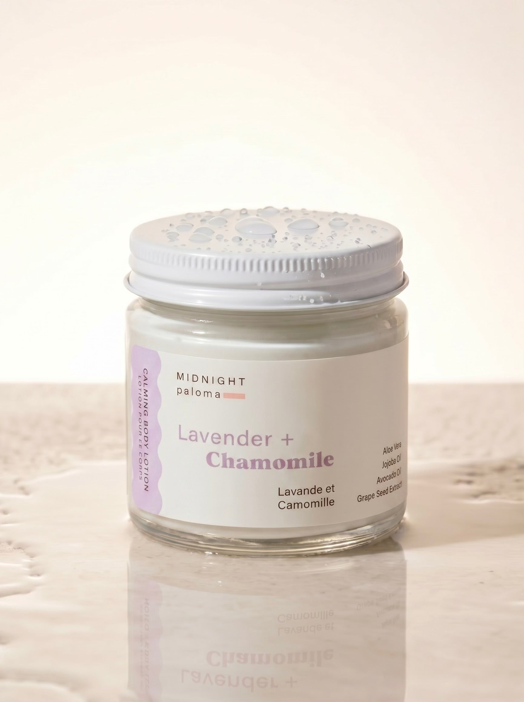 Jar of lavender and chamomile product on a light background