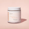 Grapefruit + Mandarin Body Lotion 4 oz jar on pink background, hydrating formula with tropical scent by Midnight Paloma