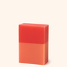 Red and orange gradient bar of soap on a white background