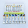 Set of Natural Acrylic Paint tubes with packaging on a light blue background