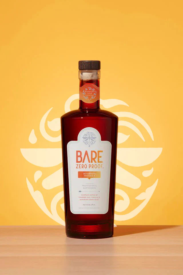 Bottle of Bare Zero Proof on a wooden surface with a yellow background  The Sobr Market