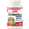 A white plastic bottle of Nutridom Berberine 1000 dietary supplement with a white cap, featuring a white, red, and blue label with product details and a Veggie Caps badge.