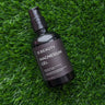 Bottle of 'Magnesium Gel Beauty Magnesium Gel' on a grass background