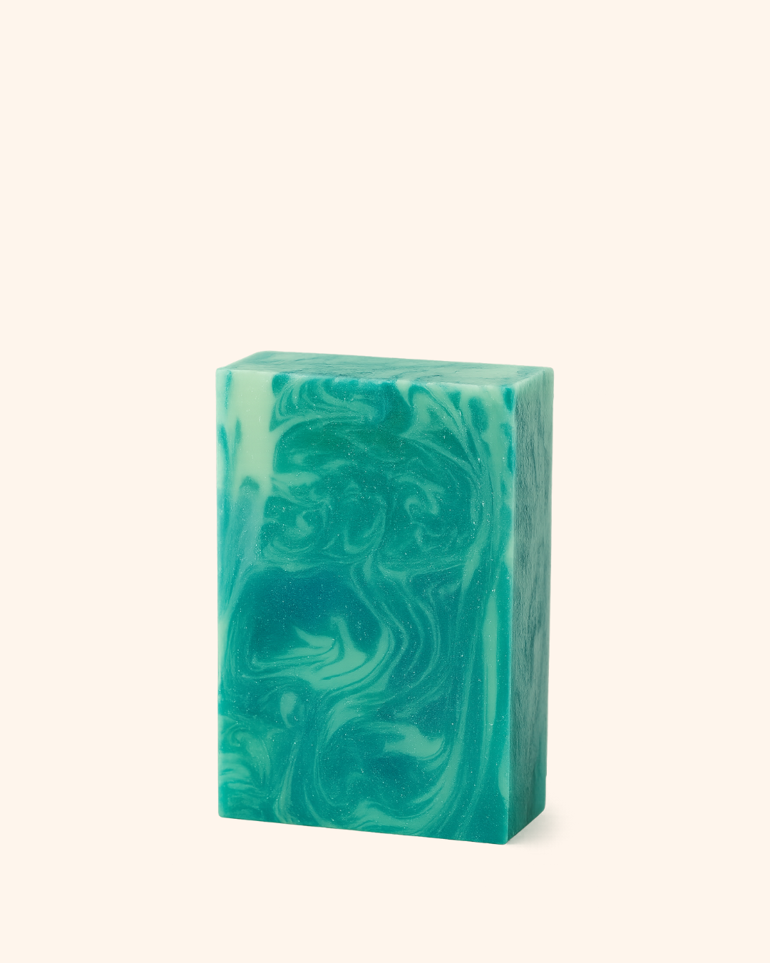 Green marbled soap bar on a white background