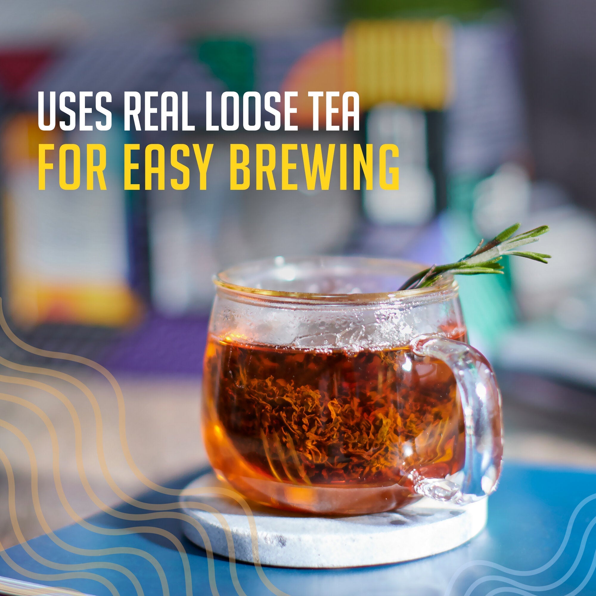 Glass mug of tea with a sprig of rosemary on a blurred background with text about using real loose tea for easy brewing.