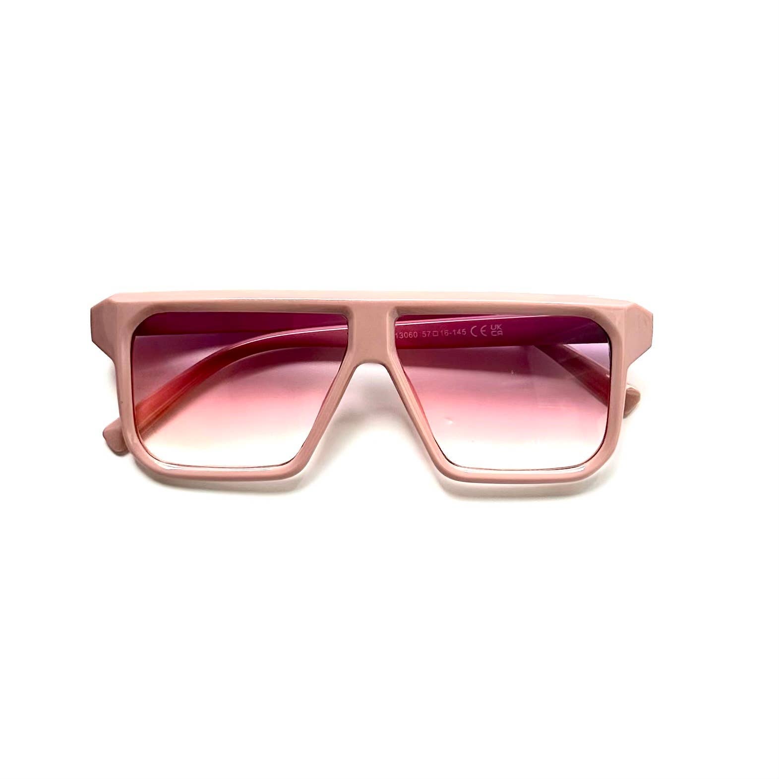 Oversized pink framed gradient rose lenses sunglasses folded front view