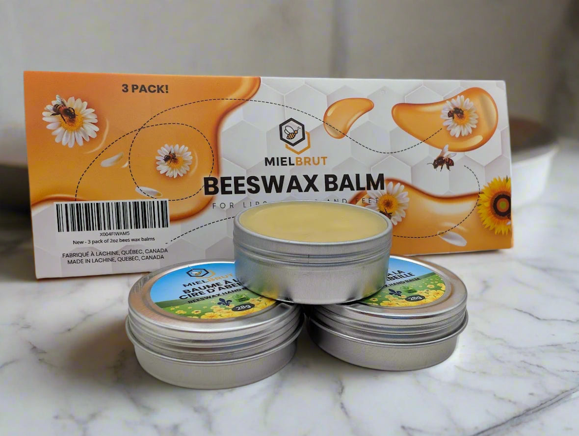 MielBrut beeswax balm with packaging on a marble surface