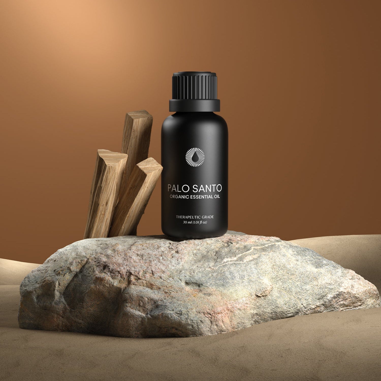 Palo Santo essential oil bottle on a rock with wooden sticks against a brown background