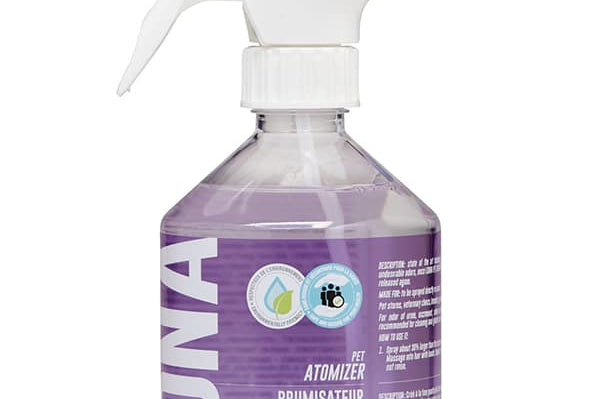 Purple spray bottle with white nozzle on a white background