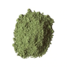 Green powder on a white background