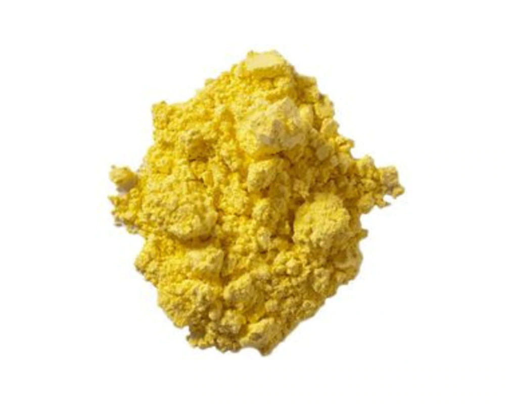 Yellow powder on a white background