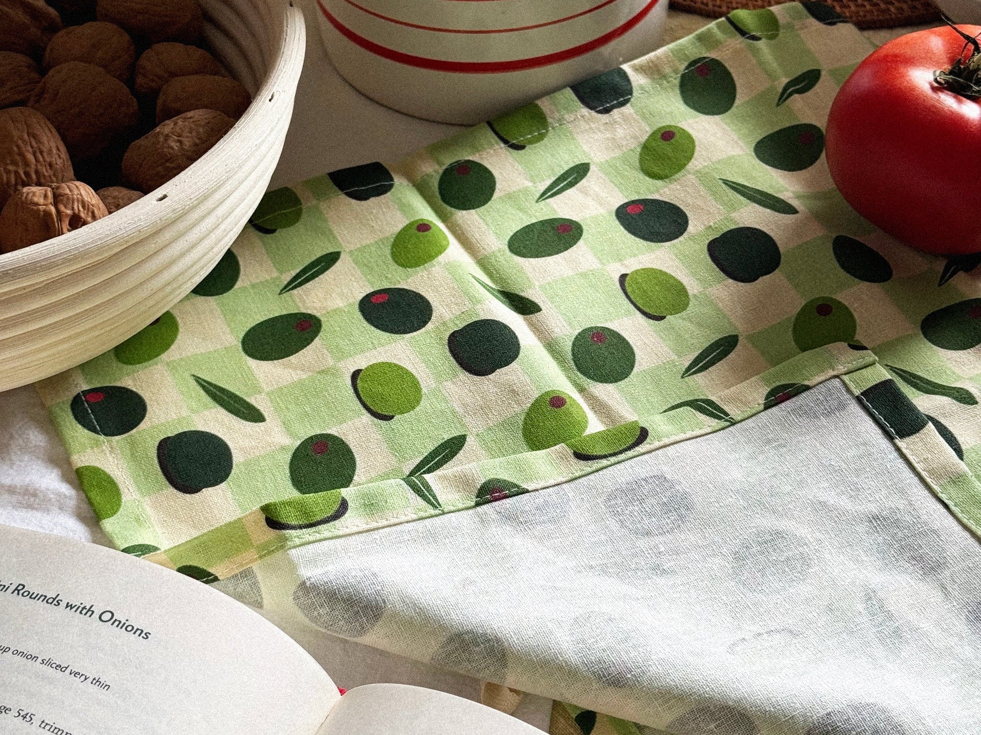 Olive patterened tea towl by Freon Collective