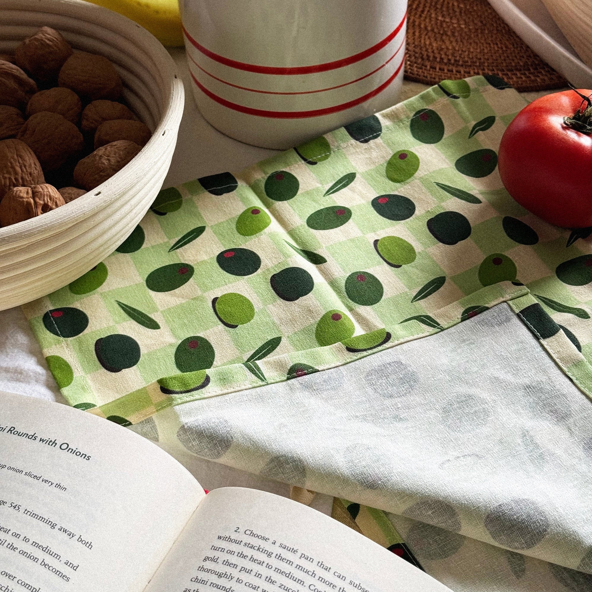 Olive patterened tea towl by Freon Collective