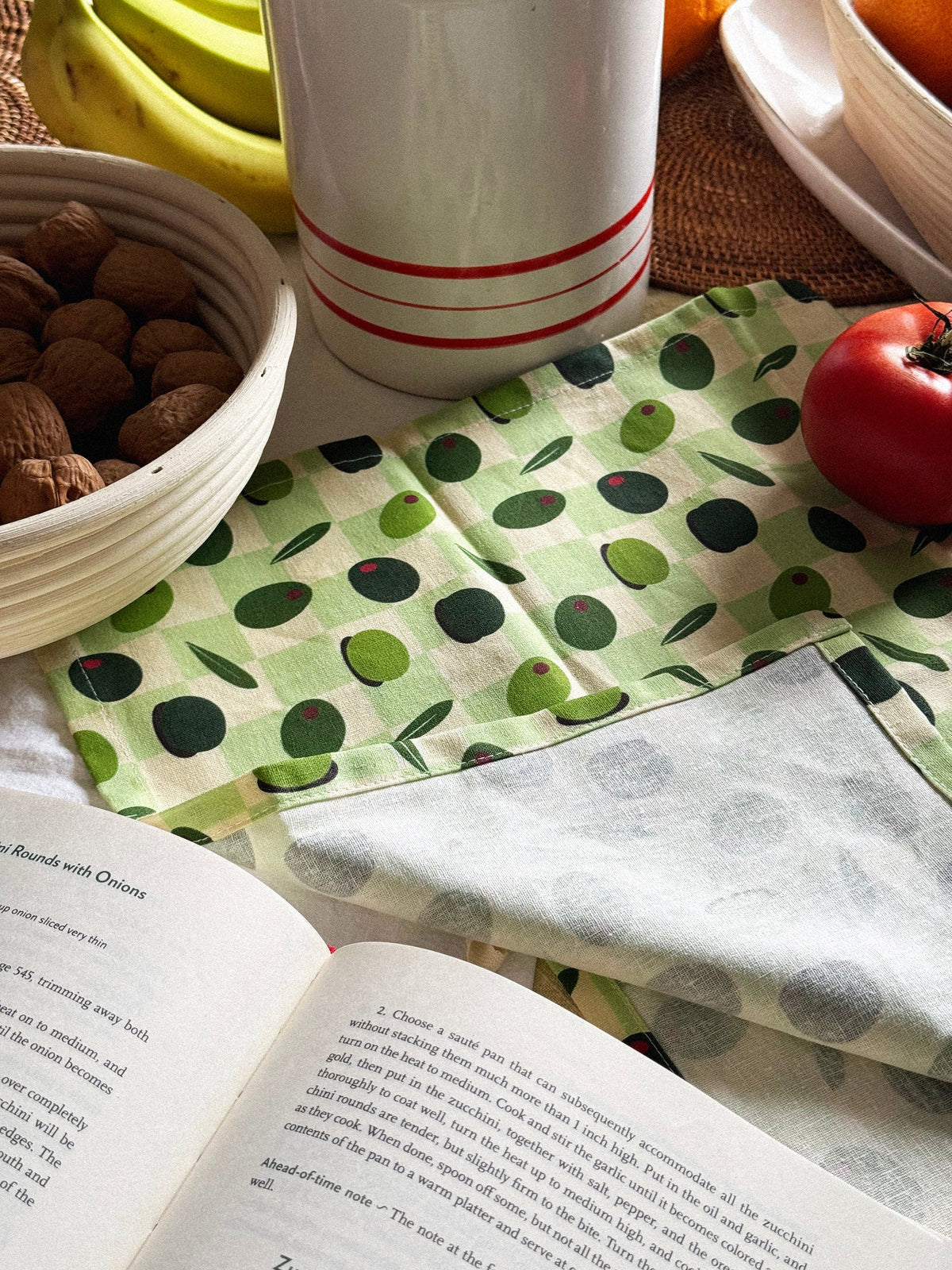 Olive patterened tea towl by Freon Collective