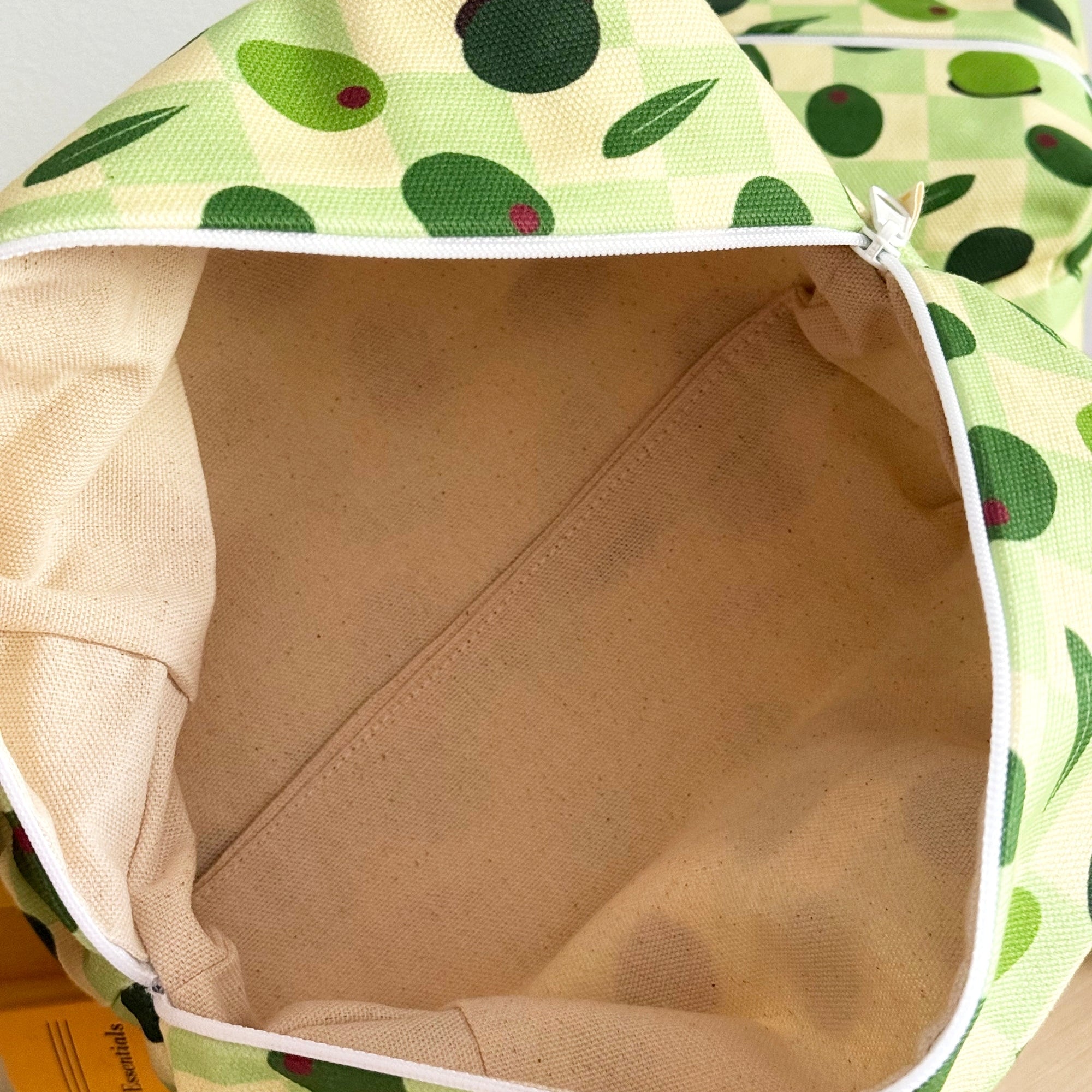 Open lemon themed makeup bag by Freon Collective