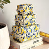 Three lemon themed stacked make up bags by Freon Collective