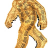 A hand carved wooden Sasquatch Crib board shaped like a walking sasquatch, featuring pre-drilled peg holes for toy storage, shown on a white background 